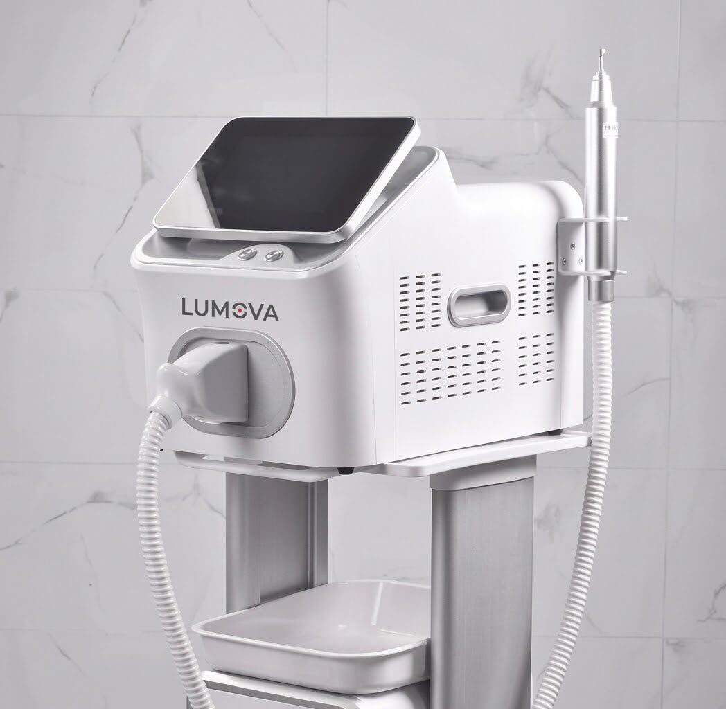 Lumova Lunar laser on a treatment trolley with touchscreen and handpieces